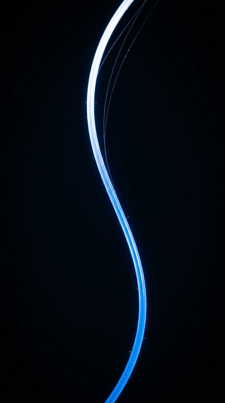 Cinematic style frame - a single sinuous blue-to-white light strand curving through pure black